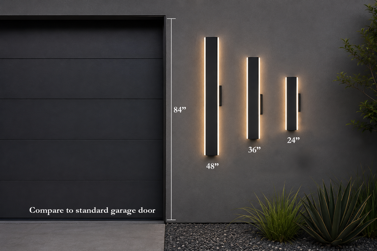 Three vertical outdoor wall light fixtures in black with warm white LED lighting, shown mounted on a gray wall next to a dark garage door. White text indicates the heights with a note comparing to a standard garage door.